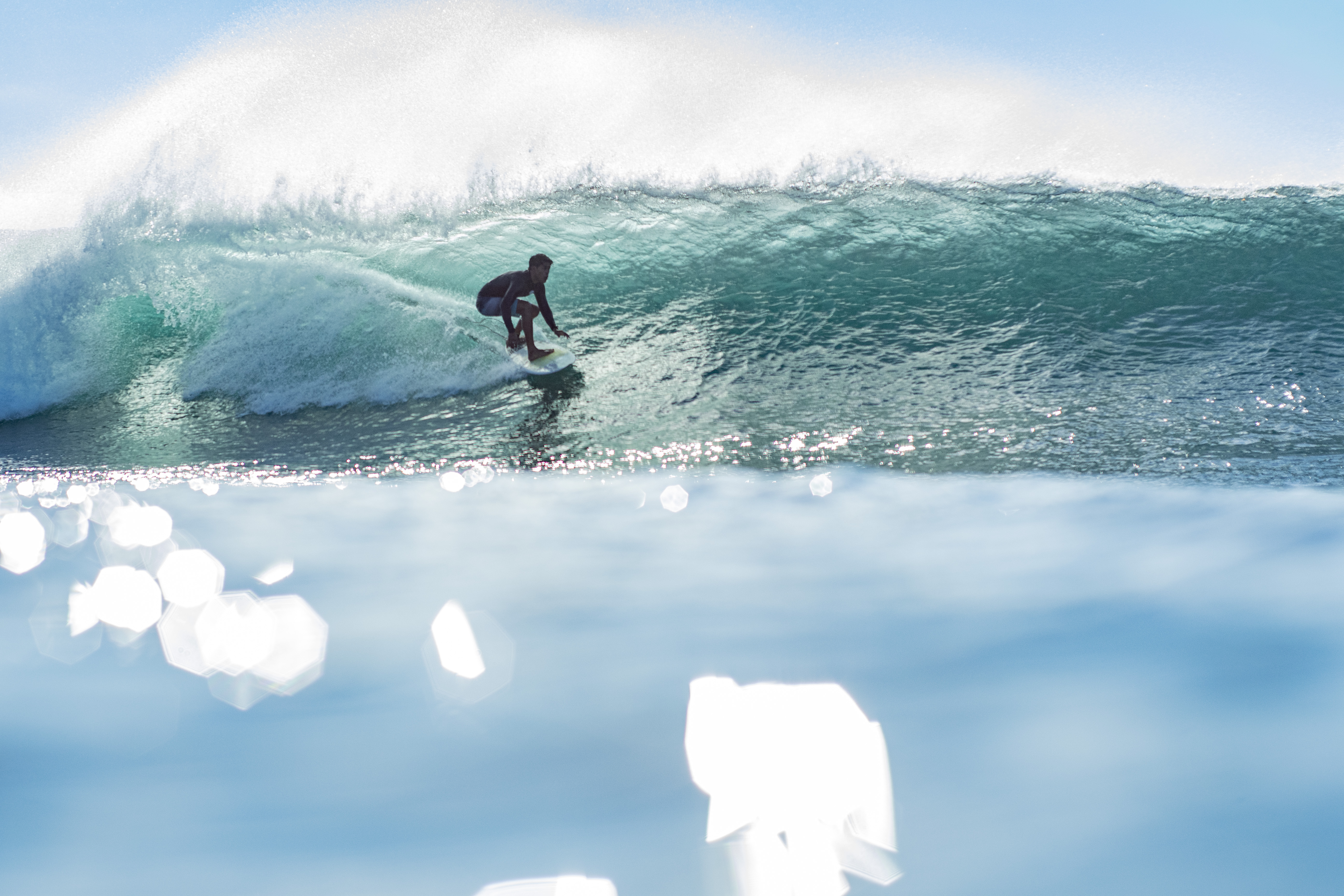 Big wave surfer riding a powerful swell in San Cristobal during El Niño 2026 2027.